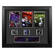 Film Cells > Nightmare Before Christmas - Own a piece of the movie! Beautifully mounted and framed! A must-have collectible! It is the same routine every year in Halloweentown, on Halloween the monsters come out and perform a real scare. This particular Halloween, the pumpkin king Jack Skellington, bored of the idea, saunters off into the woods with his dog Zero after Halloween night. Upon the break of dawn, he discovers a clearing of trees with different doors representing various holidays. The Christmas Tree door attracts his attention and upon entrance into the world of Christmas, Jack is fascinated with this new idea of Christmas that he must absolutely share with the citizens of Halloweentown! This highly-detailed framed triple film cell measures 11-inches tall x 13-inches wide. Limited to just 2,500 pieces worldwide! Order yours today! Please note that the actual cell of film may vary from piece to piece, as they are hand-selected from reels of film.: Sizes 