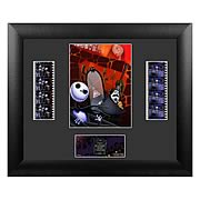 Film Cells > Nightmare Before Christmas - This eye-popping double film cell will take you back to Halloweentown!    Attractively mounted and framed.      Limited to 2,500 pieces.       Limited to 2,500 pieces, this eye-popping double film cell will take you back to Halloweentown and   The Nightmare Before Christmas!  It measures 11-inches tall x 13-inches wide and includes a print and actual cells of film, all attractively mounted and framed.  Order yours today!  Please note that the actual cells of film may vary from piece to piece, as they are hand selected from reels of film.      Its the same routine every year in Halloweentown-- on Halloween, the monsters come out and perform a real scare. This particular Halloween, Pumpkin King Jack Skellington, bored of the idea, saunters off into the woods with his dog Zero after Halloween night. Upon the break of dawn, he discovers a clearing of trees with different doors representing various holidays. The Christmas Tree door attracts his attention and upon entrance into the world of Christmas, Jack is so fascinated with this new idea of Christmas that he absolutely must share with the citizens of Halloweentown.: Sizes 