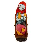 Paperweights > Nightmare Before Christmas - Celebrate Christmas and Halloween...any time of year! A stunning resin paperweight featuring Jack Skellington from  The Nightmare Before Christmas . Fully painted and highly detailed! Nightmare Before Christmas Sally Resin Paperweight. Accessorize your office with great Nightmare Before Christmas Style! This highly detailed paperweight is sculpted from resin, and features Sally reclining in a coffin, holding a rose. Measures 4-inches tall x 6 1/2-inches wide x 4 1/2-inches long. Order yours today!: Sizes 