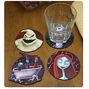 Coasters > Nightmare Before Christmas - Protect your tabletops with the residents of Halloweentown! Set of 4 wooden coasters featuring characters from  The Nightmare Before Christmas  Jack Skellington, Sally, Oogie Boogie, and Lock, Shock and Barrel! Protect your tabletops with the residents of Halloweentown, with this Nightmare Before Christmas Coaster 4-Pack! Each 4-inch wooden coaster features your favorite characters from Tim Burtons classic  The Nightmare Before Christmas . Included in this set are Jack Skellington, Sally, Oogie Boogie, and Lock, Shock and Barrel. Order yours today!: Sizes 