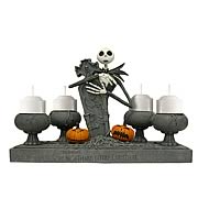 Candle Holders > Nightmare Before Christmas - Celebrate Christmas and Halloween any time of year! A detailed resin votive candle holder featuring Jack Skellington from  The Nightmare Before Christmas ! Style up your home or office! This charming  Nightmare Before Christmas  resin votive candle holder features the one and only Jack Skellington, crouching behind a tombstone. Can hold up to 4 votive candles. Order yours today!: Sizes 